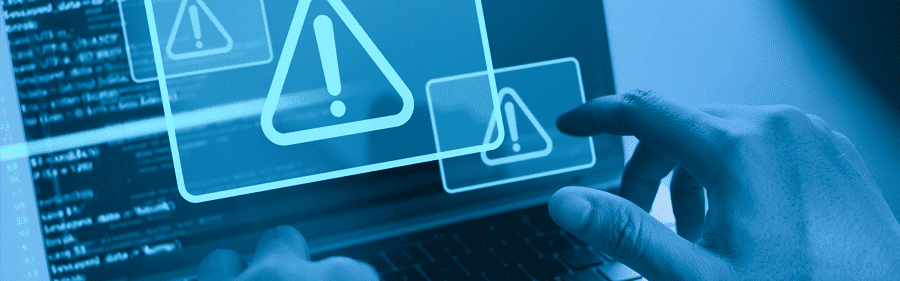 Cyber security concept. Man using computer with system hacked alert due to cyber attack on computer network. Data Protection. Internet virus cyber security and cybercrime