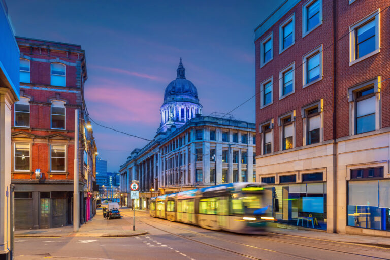 Tram In Downtown Nottingham City, Cityscape Of England At Twilight